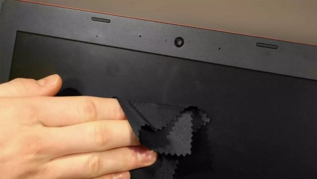 Cleaning computer with microfiber cloth